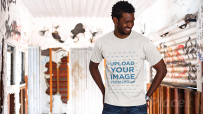 Handsome Black Man Wearing a Round Neck Tee Video Mockup in an Old Train Wagon a12781
