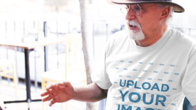 Elderly Man Having a Conversation in the Street Wearing a T-Shirt Video
