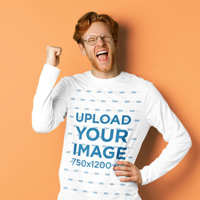 Long Sleeve Tee Mockup of a Red-Haired Man with Glasses Celebrating