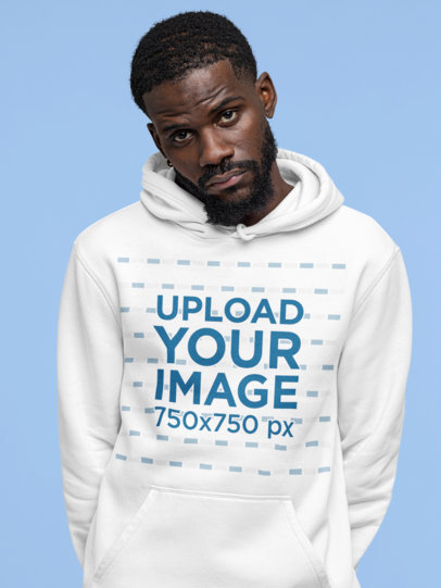 Mockup of a Man Posing with His Hands Behind His Back while Wearing a Hoodie M22416