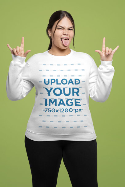 Sweatshirt Mockup Featuring a Woman Making a Rock and Roll Sign