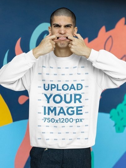 Sweatshirt Mockup of a Young Man Making a Crazy Expression