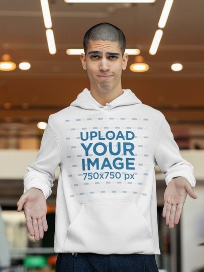 Hoodie Mockup of a Man Pointing at Something With His Hands
