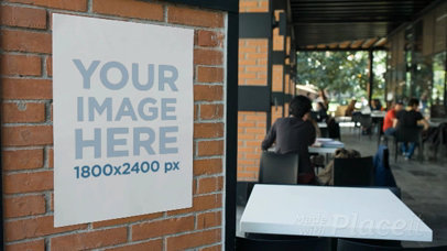 Poster Cinemagraph Mockup Glued To A Cafeteria Bricks Wall a13889