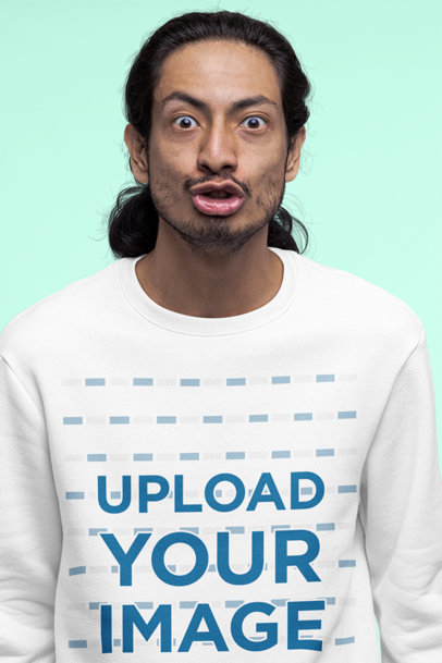 Sweatshirt Mockup of the Closeup of a Man Making a Funny Expression