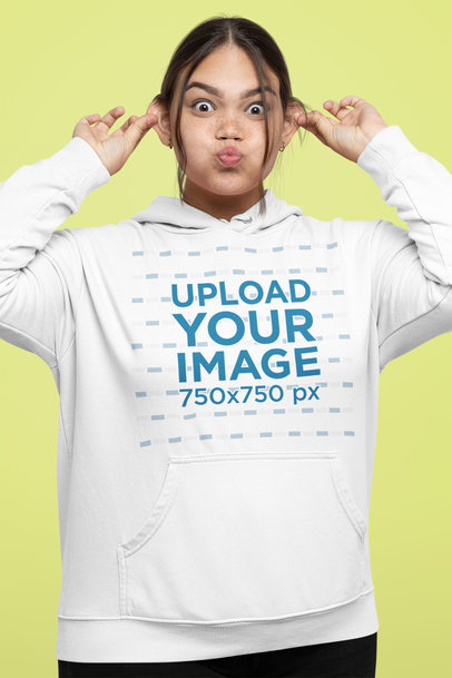 Hoodie Mockup of a Woman Making a Fun Expression to the Camera 