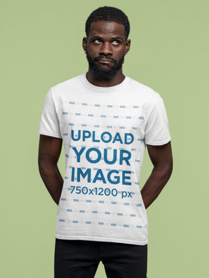 T-Shirt Mockup Featuring a Man with a Thoughtful Expression Against a Customizable Background