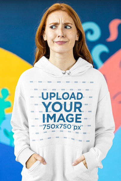 Hoodie Mockup of a Red-Haired Woman with a Confused Look
