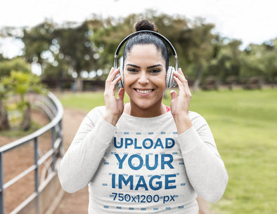 Long Sleeve Tee Mockup of a Happy Woman Jogging While Using Headphones m21055-r-el2