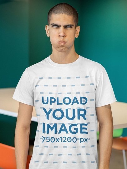 Basic Tee Mockup Featuring a Man Making a Silly Face With His Eyes Rolled 