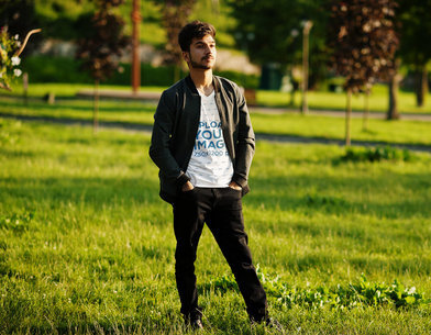 V-Neck Tee Mockup of a Bearded Man Posing at a Green Park M21049-r-el2