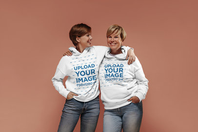 Mockup of a Woman and Her Mom Wearing Coordinated Hoodies