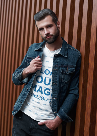 T-Shirt Mockup Featuring a Tall Fashionable Man Leaning on a Wall  m17276 r-el2