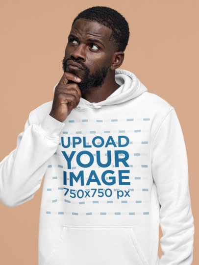 Hoodie Mockup Featuring a Pensive Bearded Man