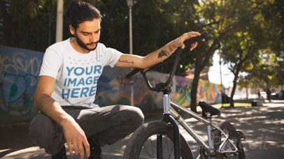 Trendy Young Man With His Bicycle Wearing a T-Shirt Cinemagraph a13369
