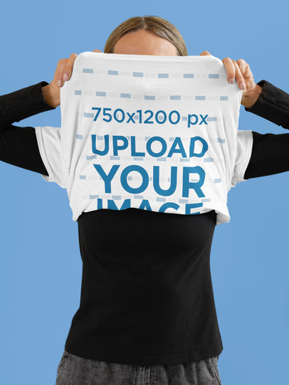 Flip-Up T-Shirt Mockup Featuring a Woman in a Studio