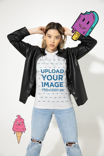 T-Shirt Mockup of a Fashionable Woman Wearing a Bold Outfit in a Studio