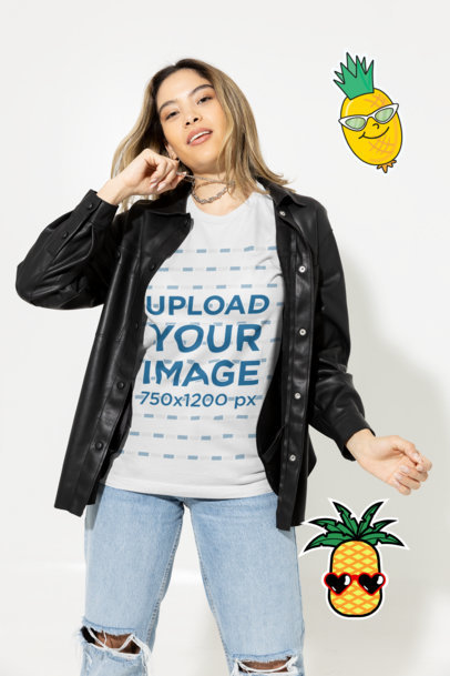 T-Shirt Mockup of a Woman Pulling her Necklace and Surrounded by Stickers