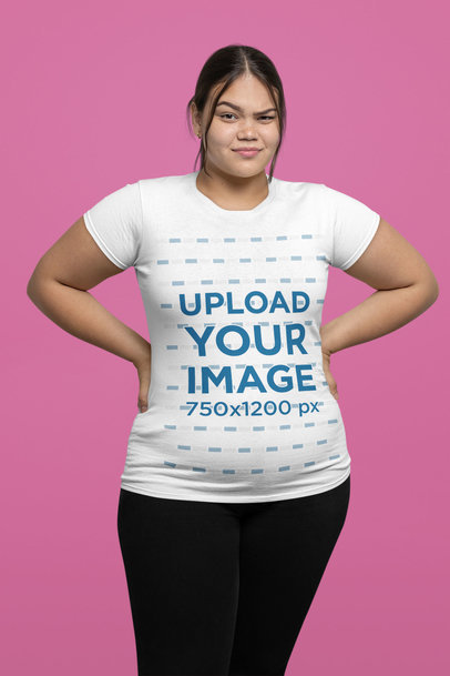 T-Shirt Mockup of a Woman Posing with a Sassy Expression on Her Face