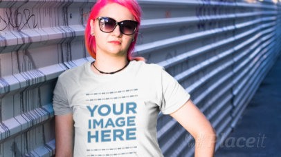 Edgy Woman Wearing a Round Neck Tee Video and Sunglasses on the Street