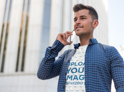 Round-Neck Tee Mockup of a Man Talking on His Smartphone
