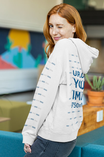 Hoodie Mockup Featuring a Woman Winking an Eye to the Camera m22410