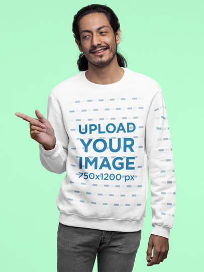 Sweatshirt Mockup of a Bearded Man Pointing to the Side in a Studio