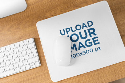 Mockup of a Mousepad Featuring White-Colored Computer Devices