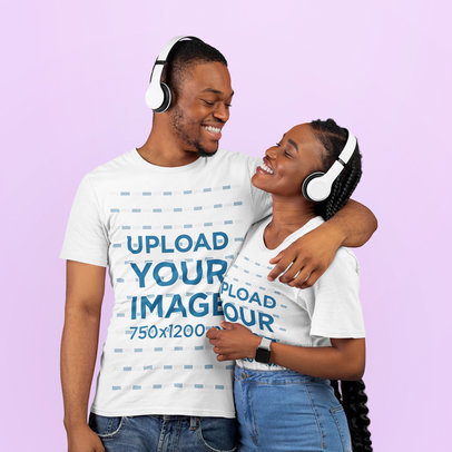 Round-Neck T-Shirt Mockup of a Smiling Couple With Headphones Posing in a Studio