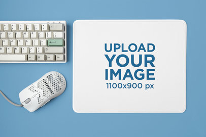 Mockup of a Mousepad Placed Next to a Mechanical Keyboard and a Mouse