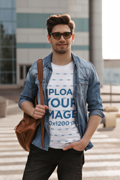 T-Shirt Mockup of a Smiling Man With Sunglasses Standing in the Street