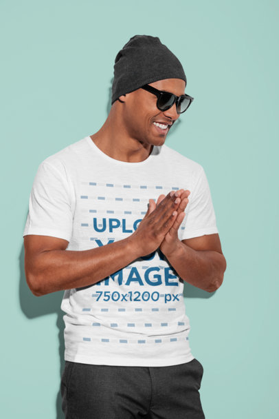 Round-Neck Tee Mockup of a Smiling Man with Sunglasses and a Beanie