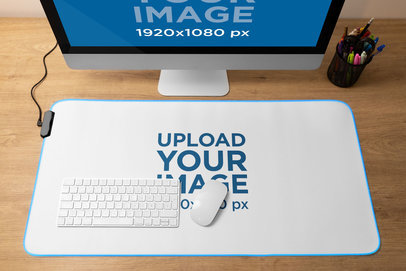 Desk Pad Mockup Featuring a Wooden Desk and an iMac