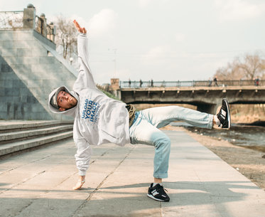 Hoodie Mockup of a Man Making a Break Dancing Move m10354-r-el2