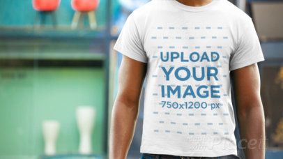 Man Standing in the Street Wearing a T-Shirt Closeup Video Mockup