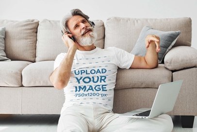 Mockup of a Bearded Man Working from His Living Room Floor