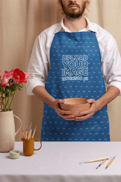 Apron Mockup Featuring a Serious Man Doing Pottery