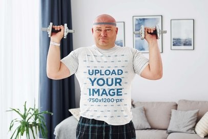 T-Shirt Mockup of a Man Doing Exercise with Hand Weights m23345-r-el2