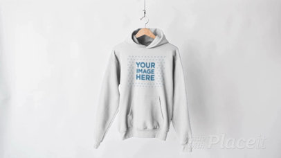 Pullover Hoodie Video on a Hanger Against White Background