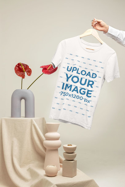 Mockup of a Woman Holding a Hook with a Bella Canvas T-Shirt Featuring a Rustic Set m23500