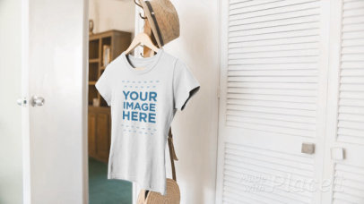 T-Shirt Mockup Video of a Tee Hanging on a Coat Stand