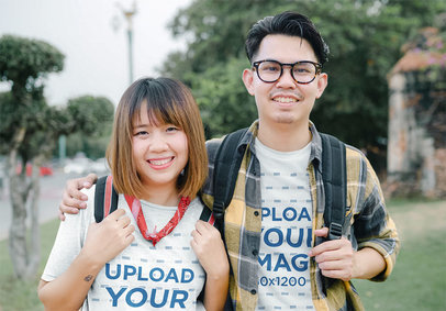 Heathered T-Shirt Mockup Featuring a Woman and a Man Hugging With a Happy Look m17149 r-el2
