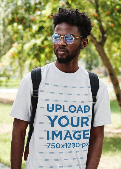 Crewneck Tee Mockup of a Bearded College Student with Glasses