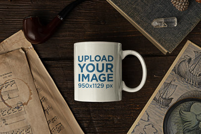Mockup of a Coffee Mug Lying on Its Side on a Wooden Table Surrounded by Vintage Items m23735