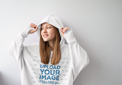Mockup of a Long-Haired Teenager Wearing a Pullover Hoodie