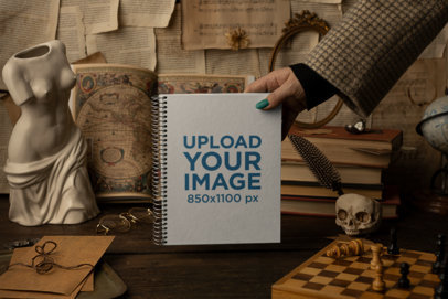 Mockup of a Woman Holding a Notebook Featuring a Dark Academia Aesthetic-Background