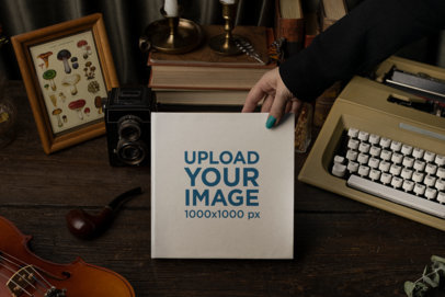 Mockup of a Book Being Held by a Woman Featuring a Dark Academia Aesthetic Background m23702