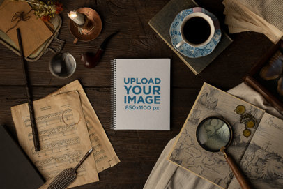 Mockup of a Notebook Surrounded by Vintage Items with a Dark Academia Aesthetic