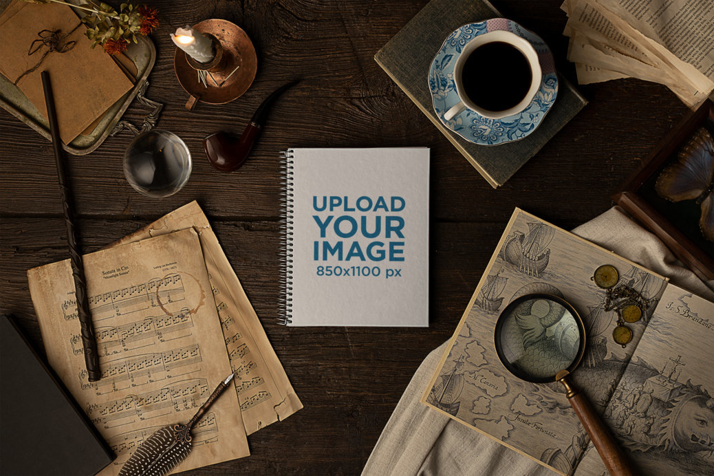 Mockup of a Notebook Surrounded by Vintage Items with a Dark Academia Aesthetic