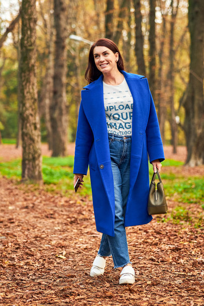 Round-Neck T-Shirt Mockup Featuring a Happy Woman Enjoying a Warm Autumn Day m11109 r-el2